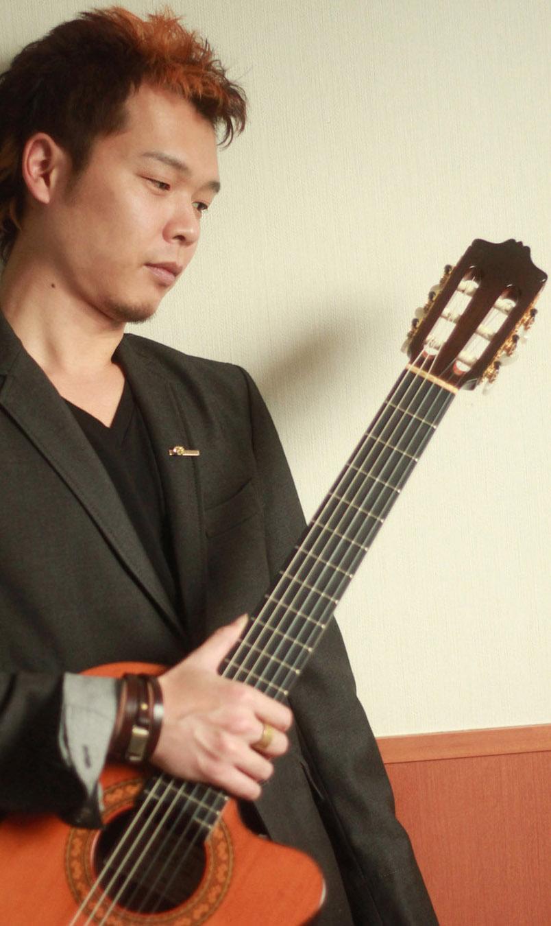 錦織賢治